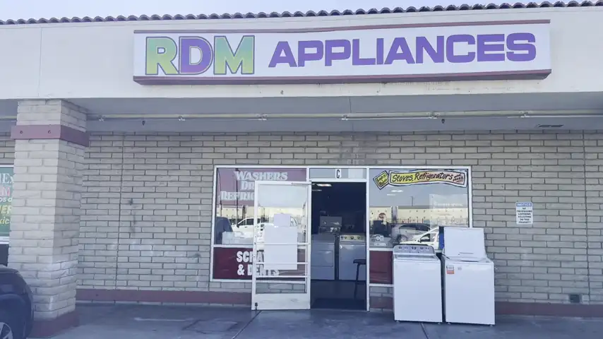 The RDM Appliances storefront on Grand Avenue with the door open